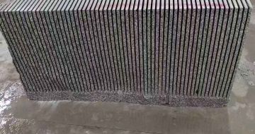 大同芝麻白毛板荒料切割