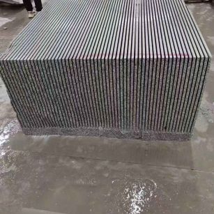 大同芝麻白毛板荒料切割